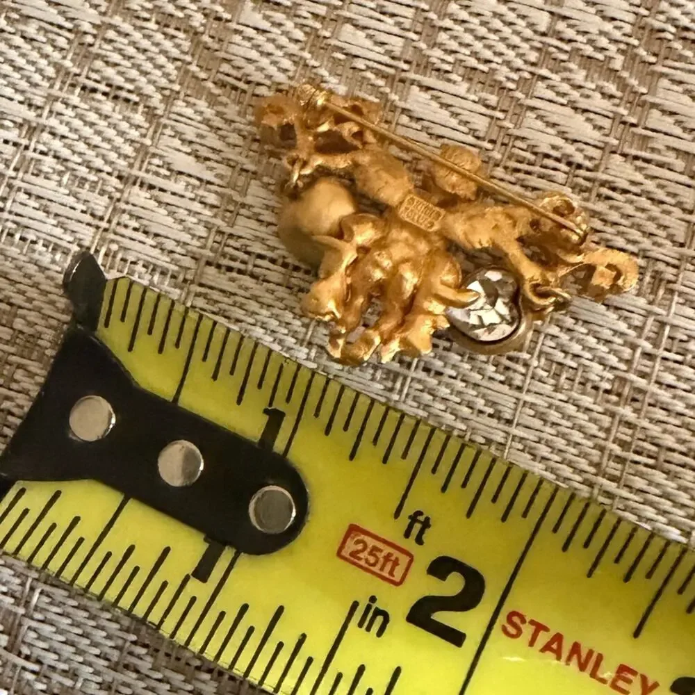 Kirks Folly cherub brooch